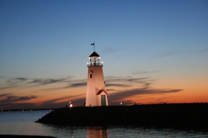A photo of Oklahoma City's own Lighthouse on Lake Hefner taken from a sailboat
